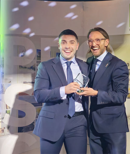 A member of staff winning an award at our awards ceremony